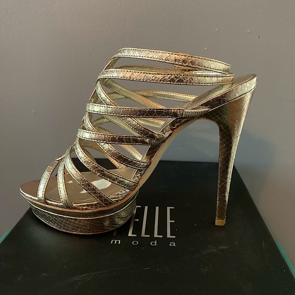 Pelle Moda gold heels.